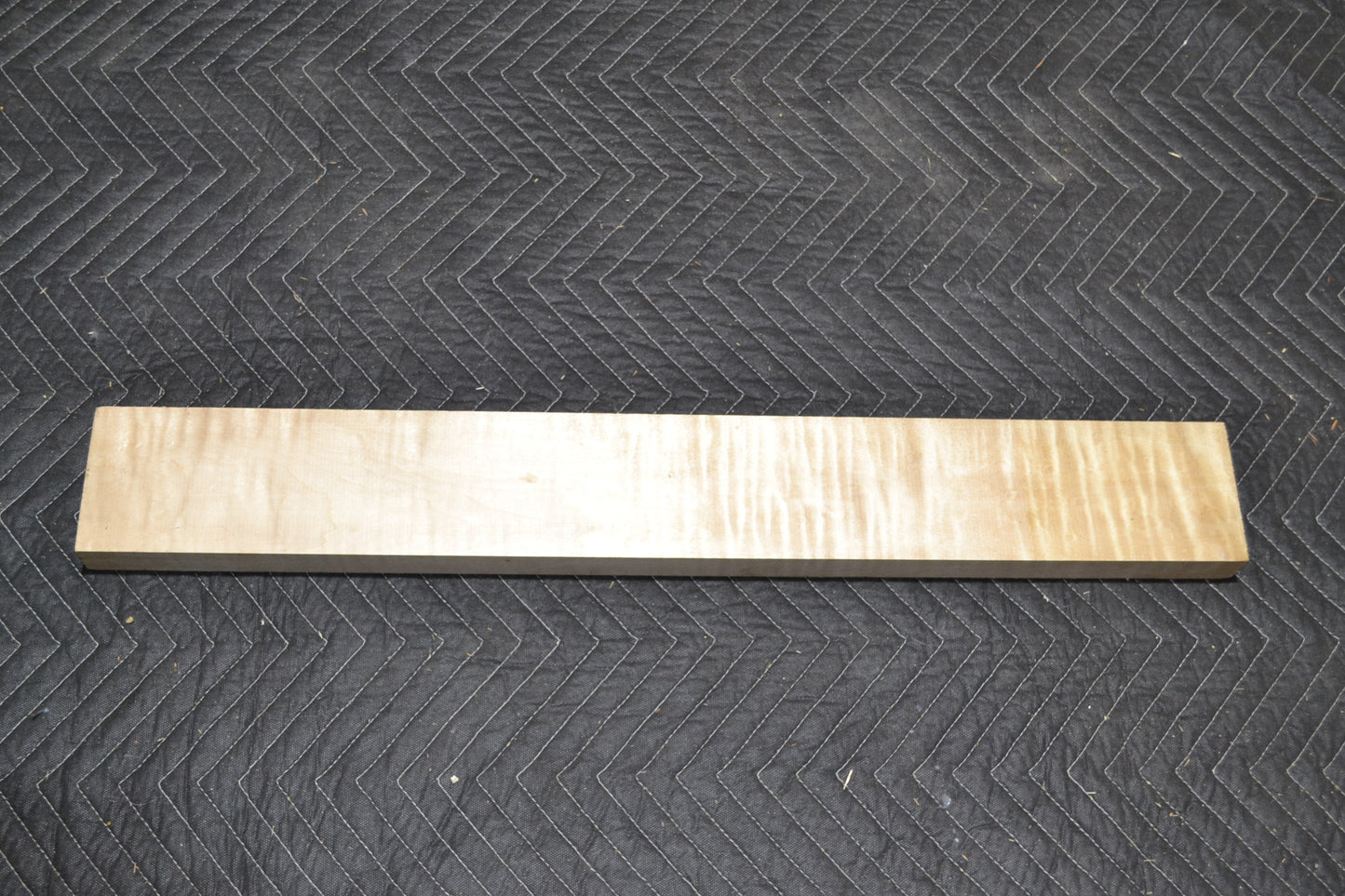 slightly curly maple neck